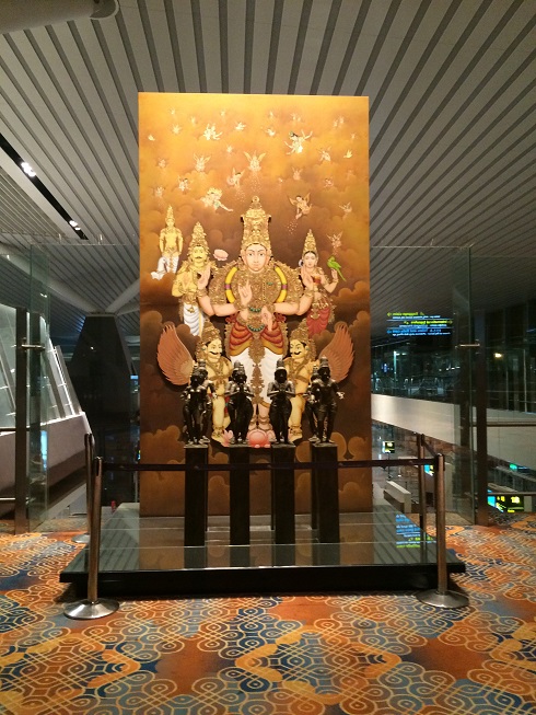 Picture and statues at the Bangalore Airport